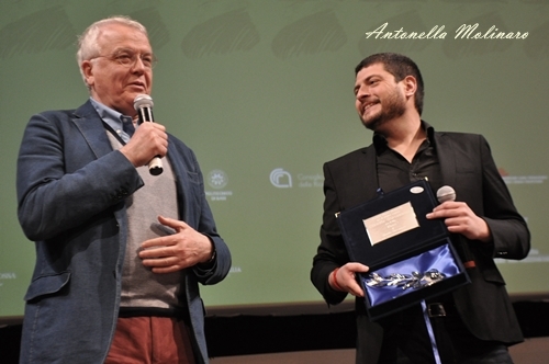 Il regista Claudio Giovannesi premiato al BIF&ST dal critico Claudio Masenza